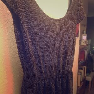 Fun black dress with small gold details