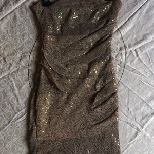 Strapless golden sequined dress