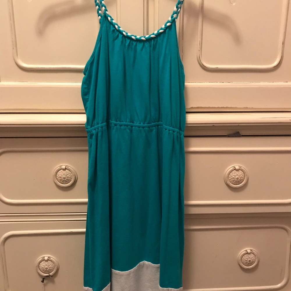 Turquoise and white dress.