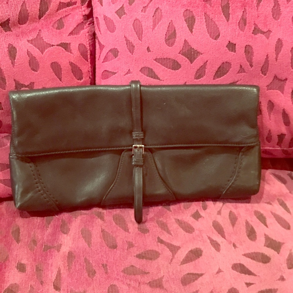 Tumi leather pull over clutch
