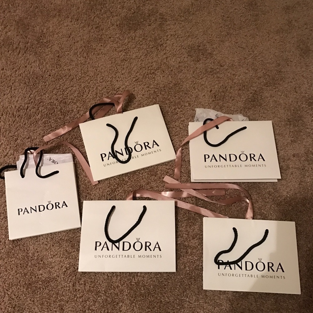 5 authentic new bags with tissue in it!! All