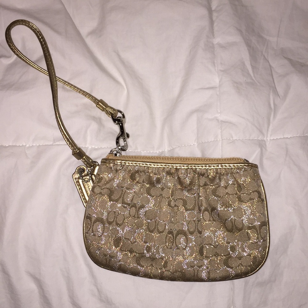 Coach gold and silver wristlet