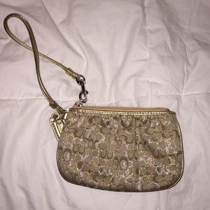 Coach gold and silver wristlet