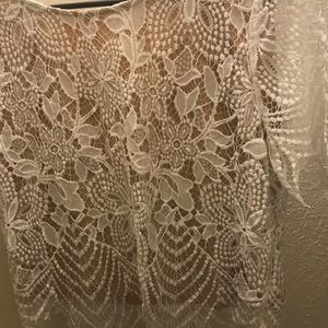 Short sleeve white lace shirt. Only worn once.