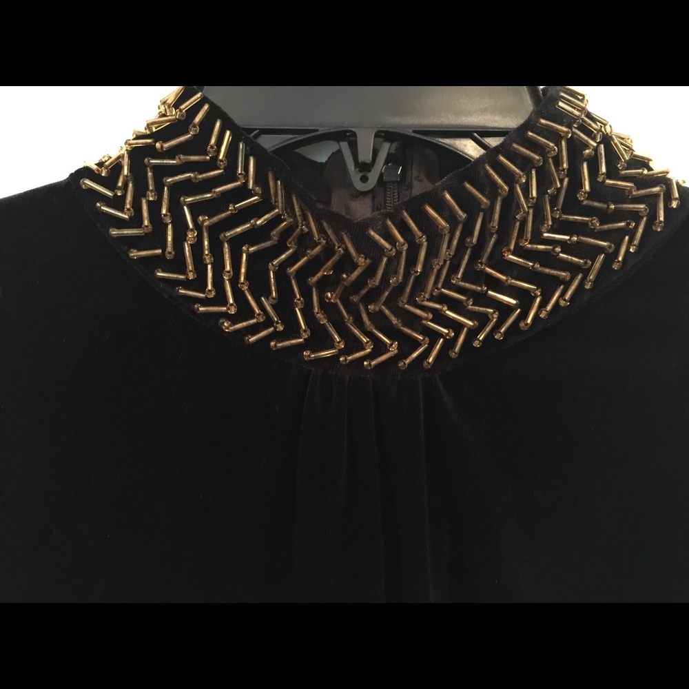 Black velvet dress with gold details