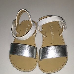 Lightly loved silver and white sandals