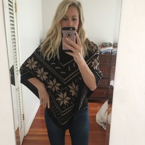 Winter poncho - black and cream snowflake design