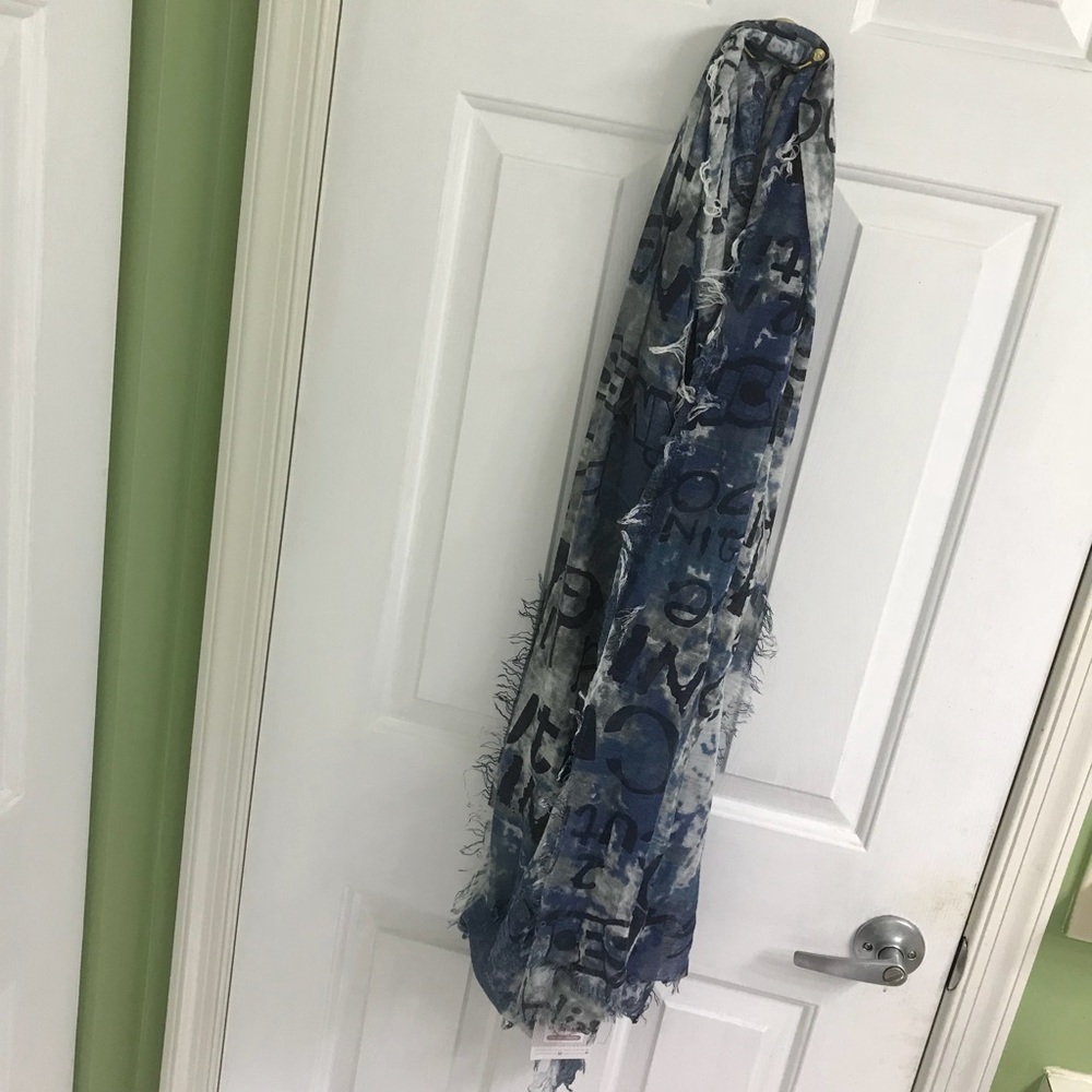 Blue and white scarf with different words on it