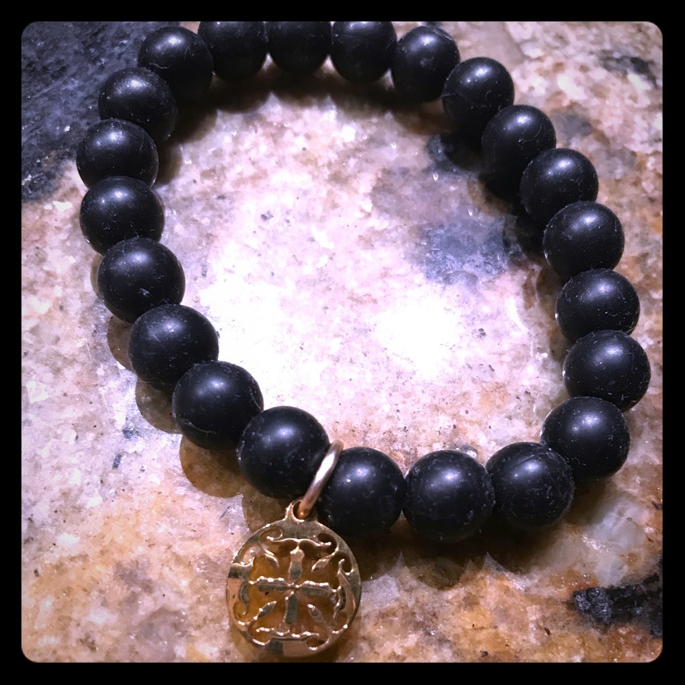 Rustic Cuff beed charm bracelet. Charm is gold.