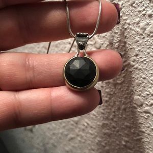Sterling and black cabochon style stone
