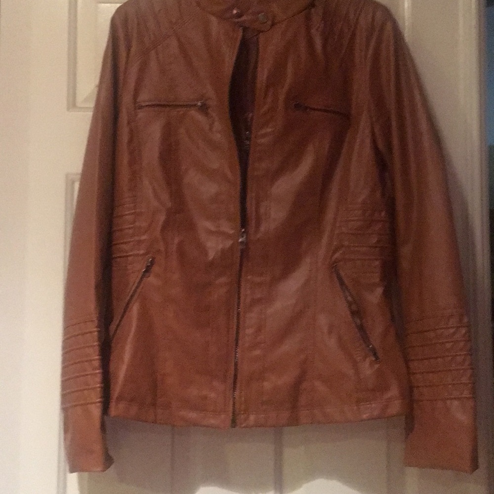 Very flattering brown Jacket.