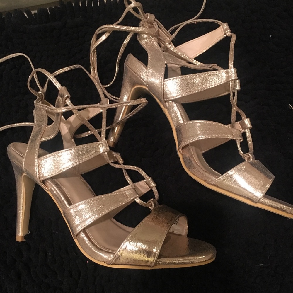 Gold high heels