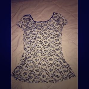 Patterned Peplum Top with Mesh Back