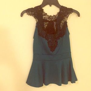 Turquoise lace up peplum top