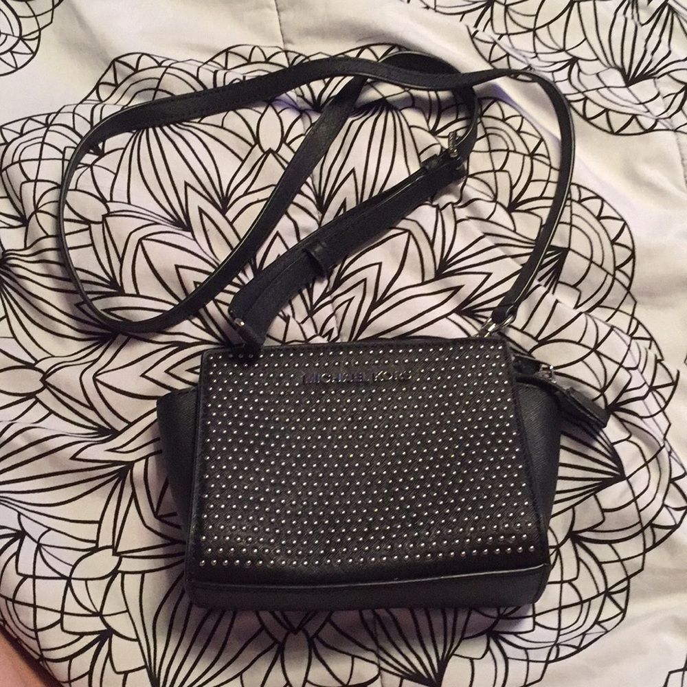 Black Michael Kors studded cross over bag