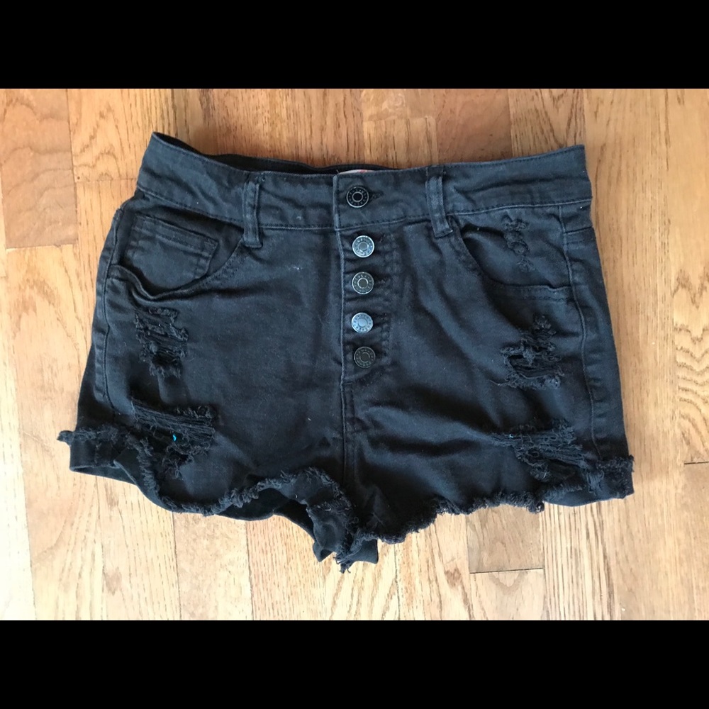 High-waisted black distressed shorts