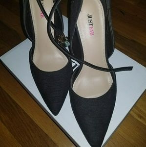 Black pumps with ankle straps