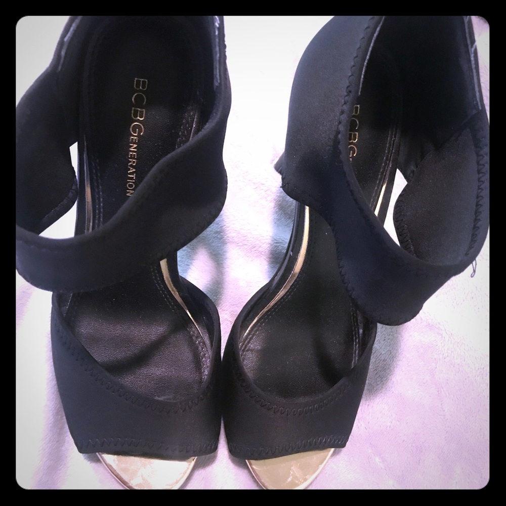 BCBGeneration Black and gold heels.