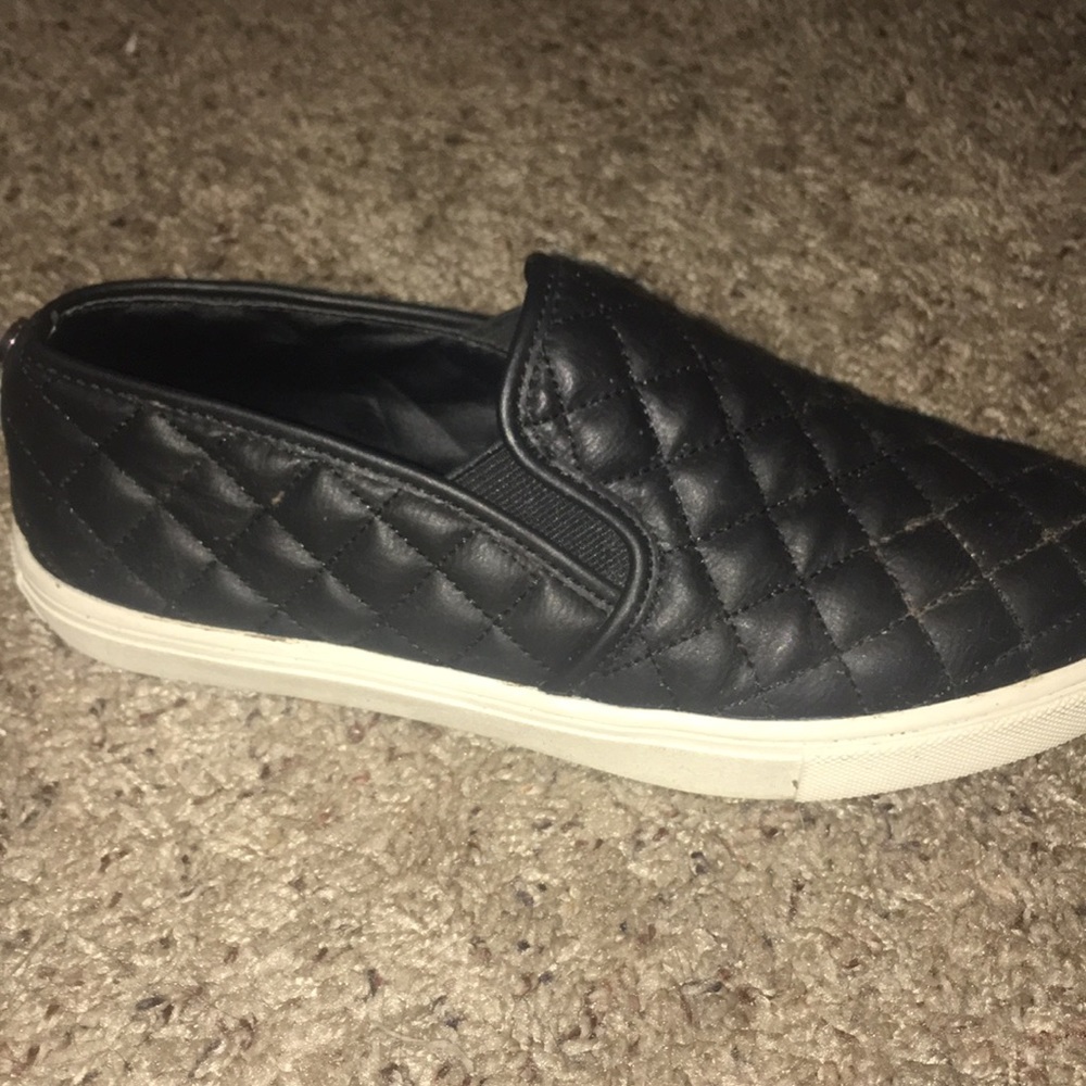 Steve Madden black slip-ons