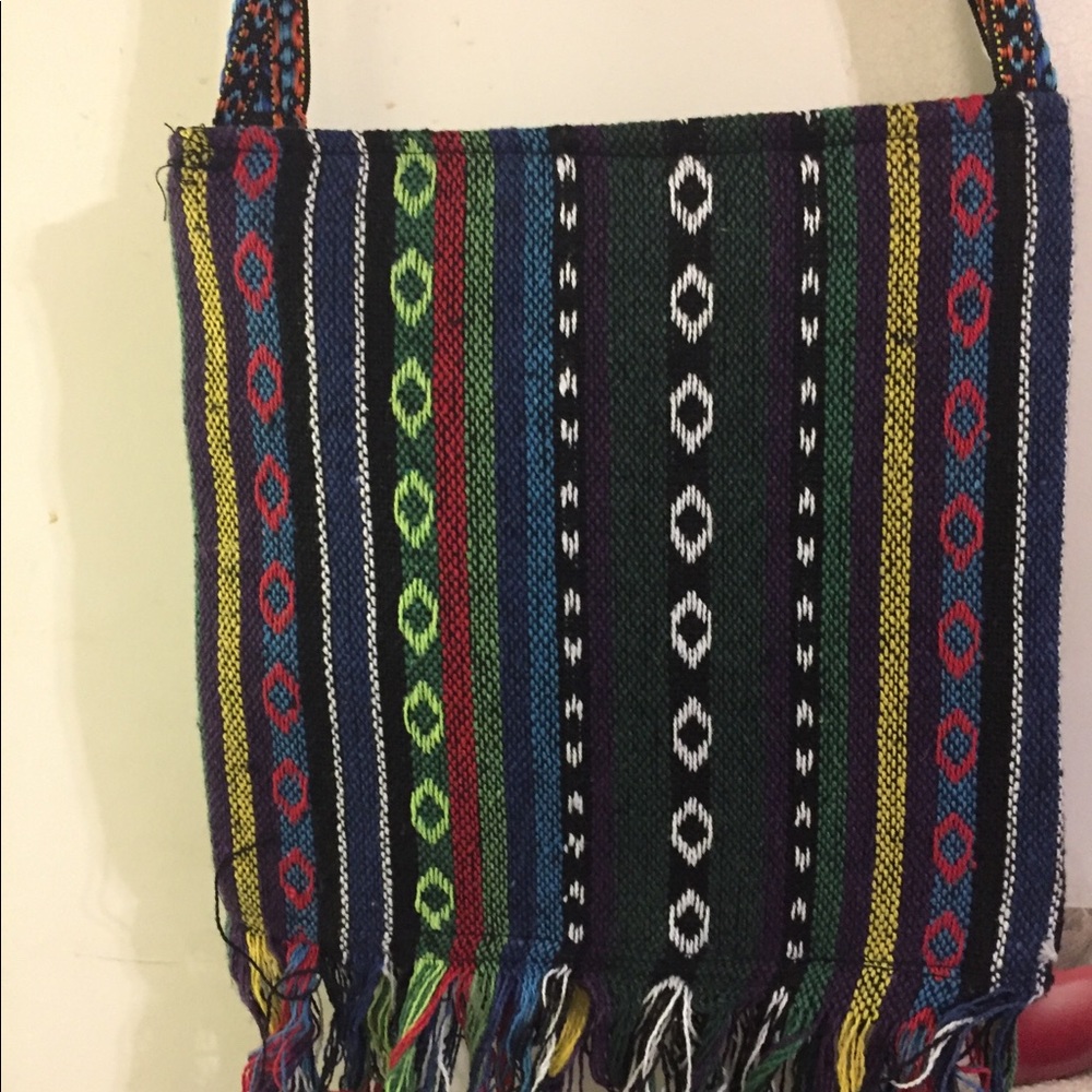 Aztec design blue woven cloth bag.