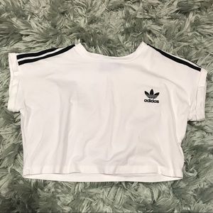 White Adidas crop top with symbol and black lining