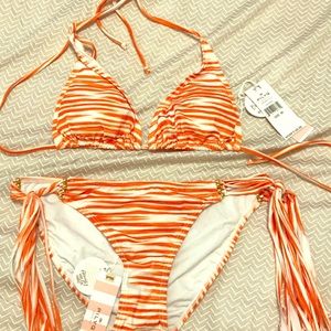 Pily Q orange and white bathing suit set