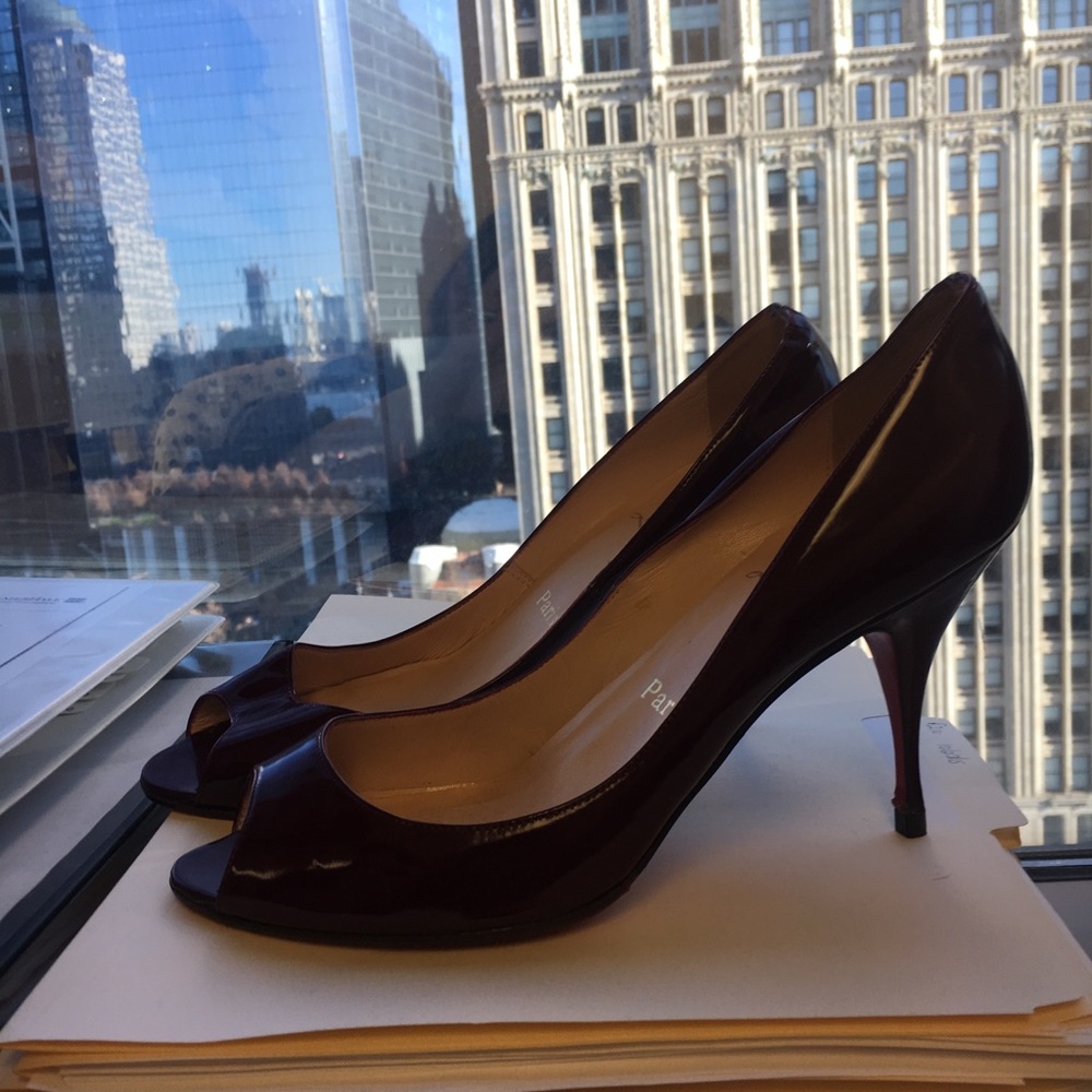 Gorgeous red patent peep toe Christian Louboutins