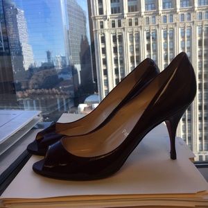Gorgeous red patent peep toe Christian Louboutins