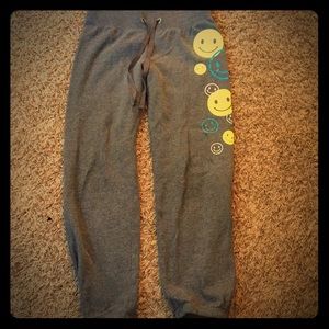 Justice gray sweatpants with emoji graphics