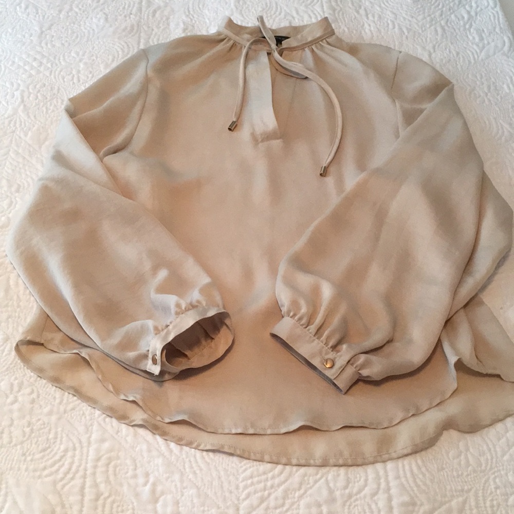 Silky tan high neck blouse size small.