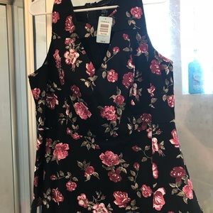 Torrid floral peplum top with cutout