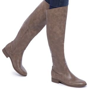 New Never worn outside. Wide calf comes with box.