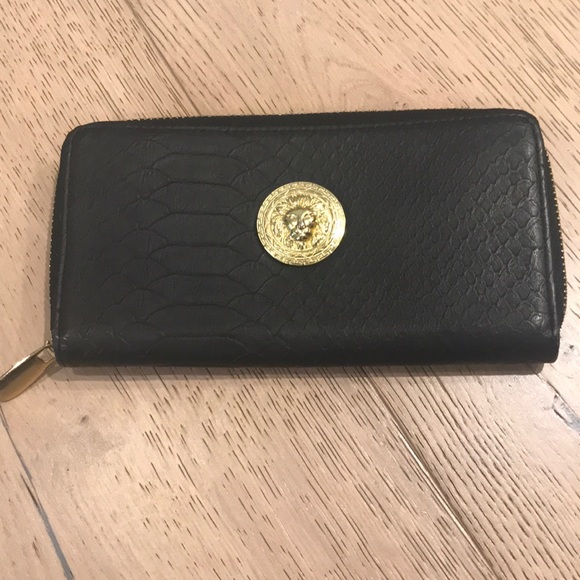 Handbags - Black wallet with gold accents in great condition