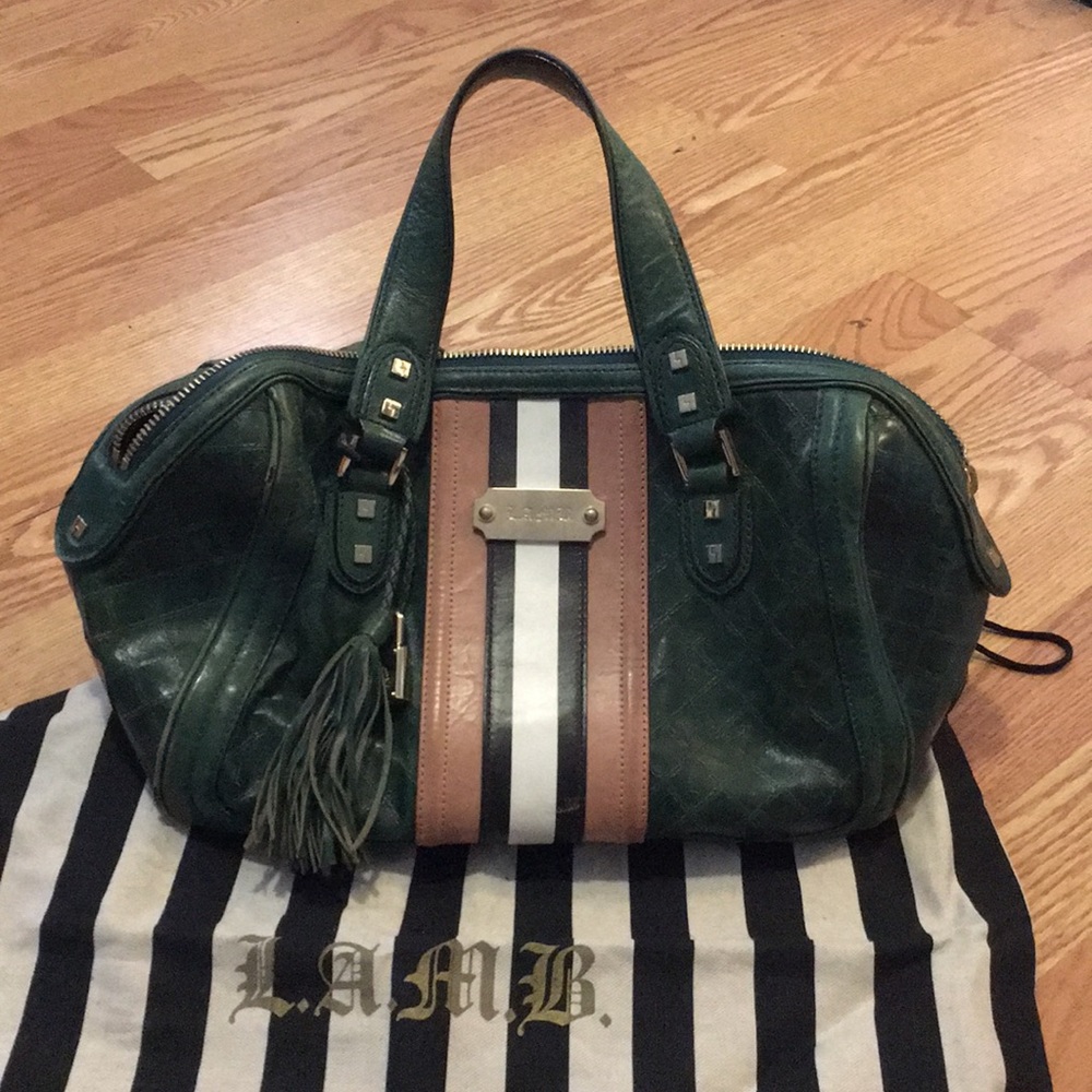 Used leather green LAMB purse with dust bag