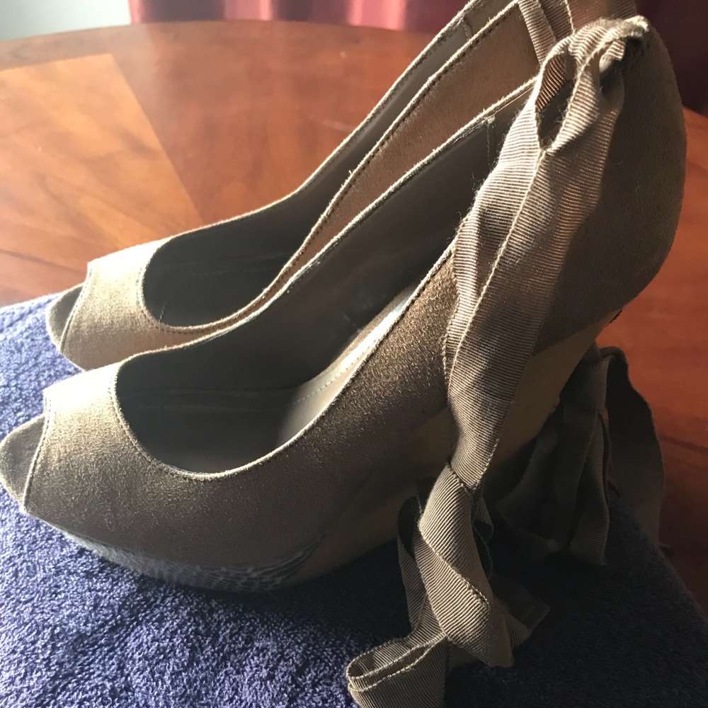 JLO wedges with a peep toe