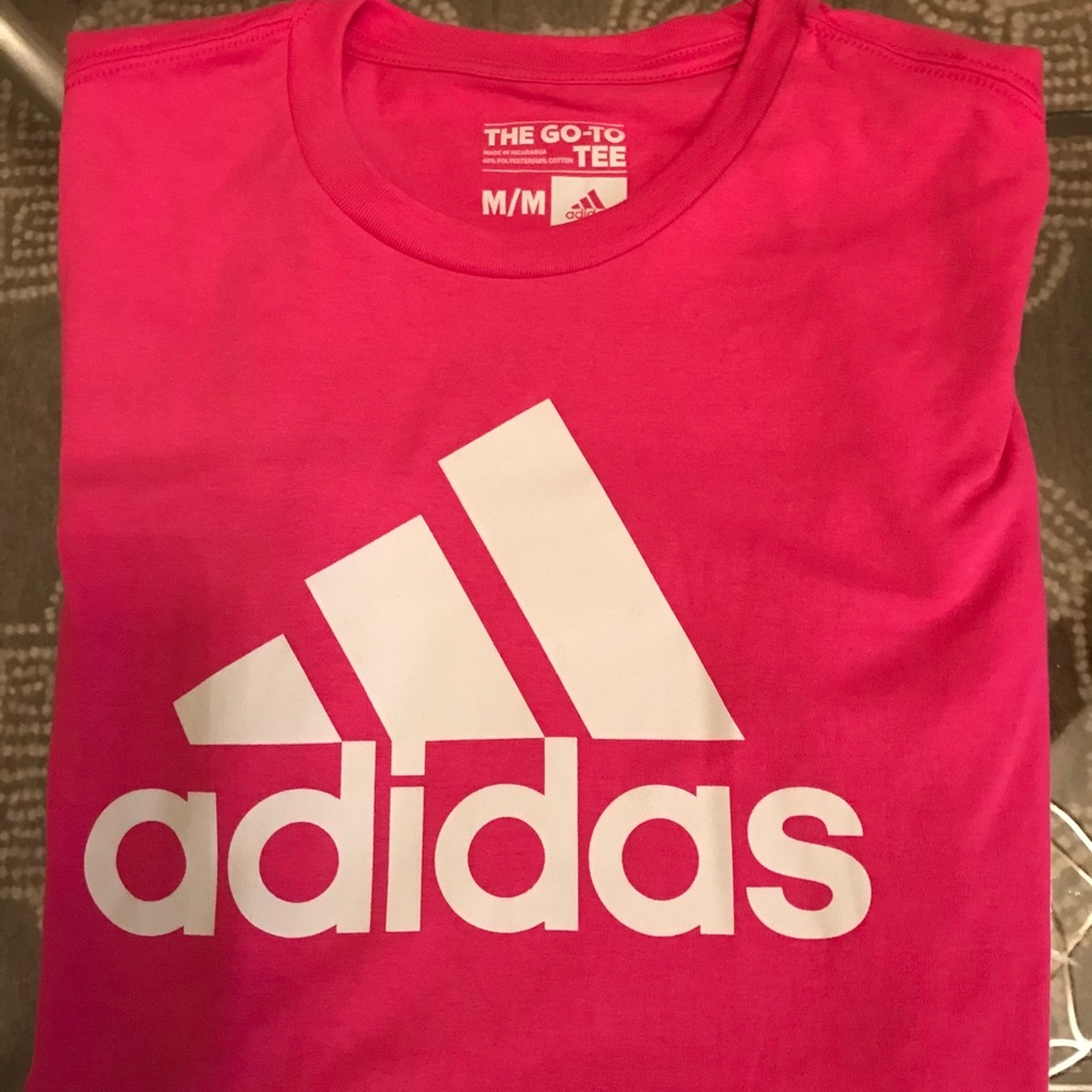 Women’s pink Adidas shirt with white logo