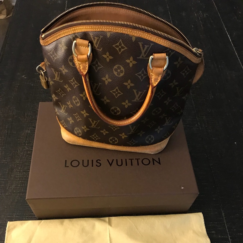 “Sold” Authentic Louis Vuitton monogram lockit pm
