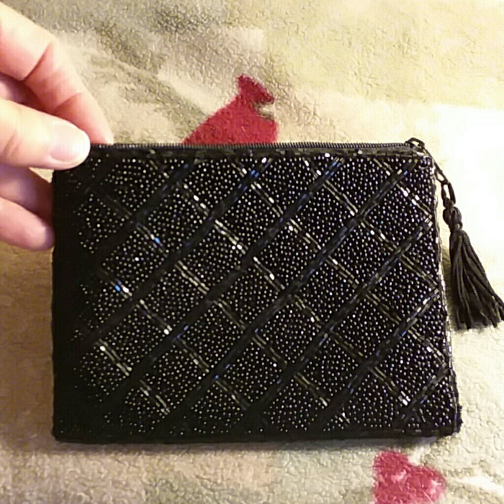 Lancome mini hand pocketbook.