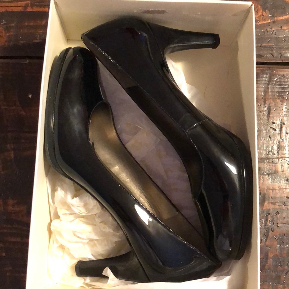 Black patent leather 3 inch heel. Brand new.