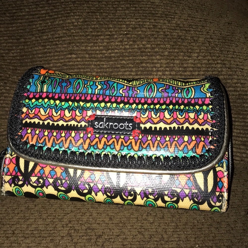 Larger wallet I used it as a Wristlet