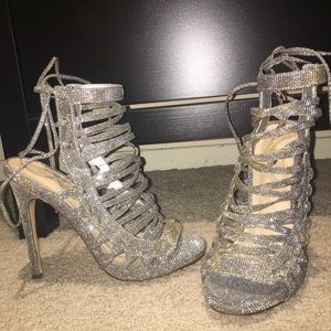 Brand new!!! Never worn metallic strap up heels!