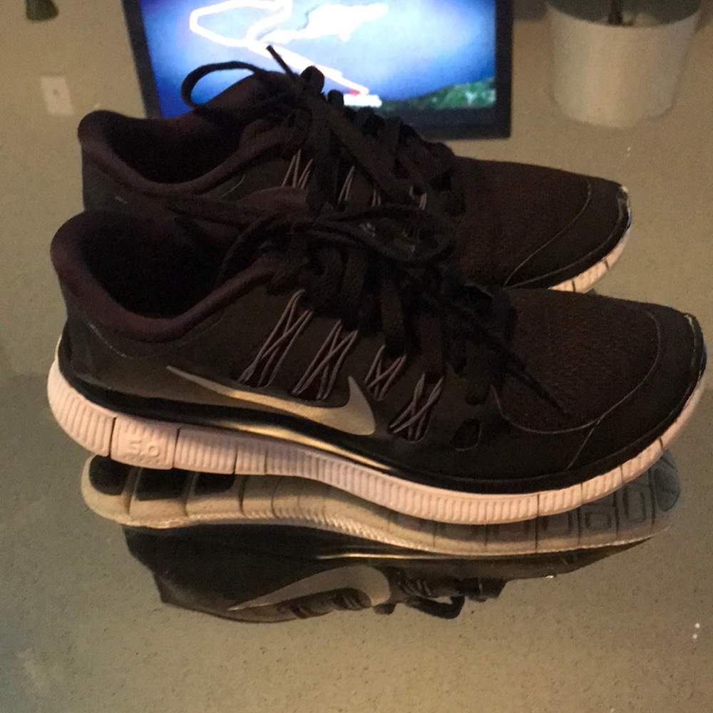 NIKE Free 5.0 sneakers.