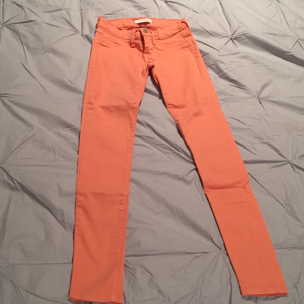 Sherbet-colored Flying Monkey skinny jeans