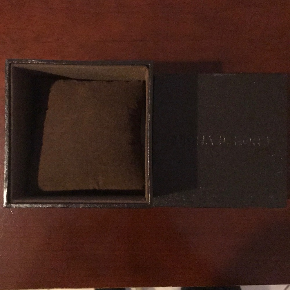 Brown Michael kors box and cushion
