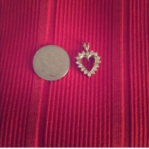 14k gold and diamond heart pendant.