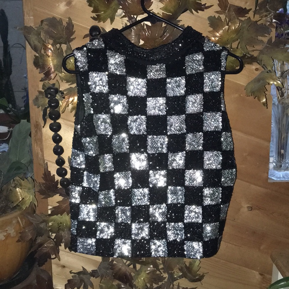 Vintage sequined top very nice , silk lined .