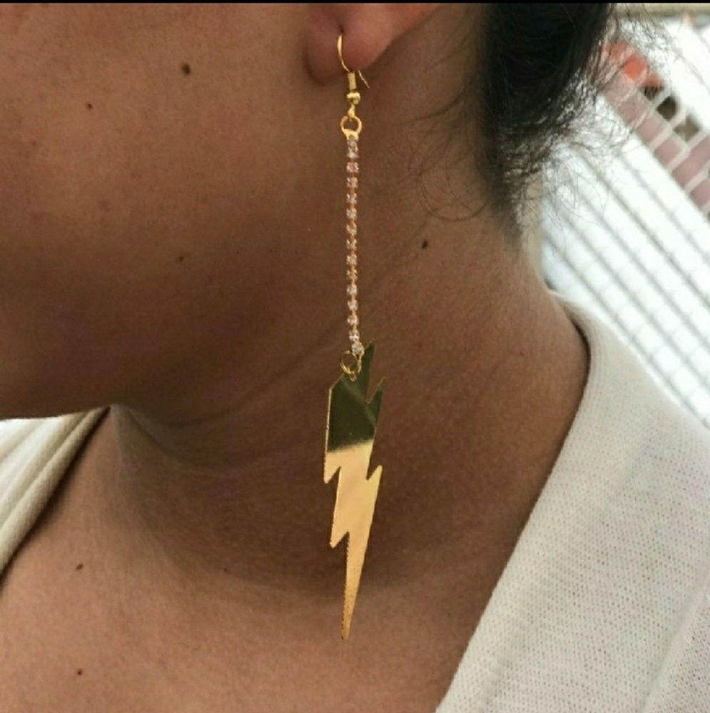 Gold thunder bolt earrings