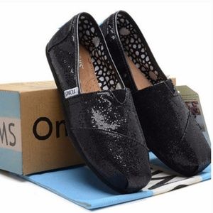 SOLD! Tom’s classic black glitter