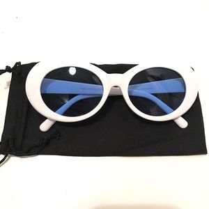 Kurt Cobain style sunglasses.