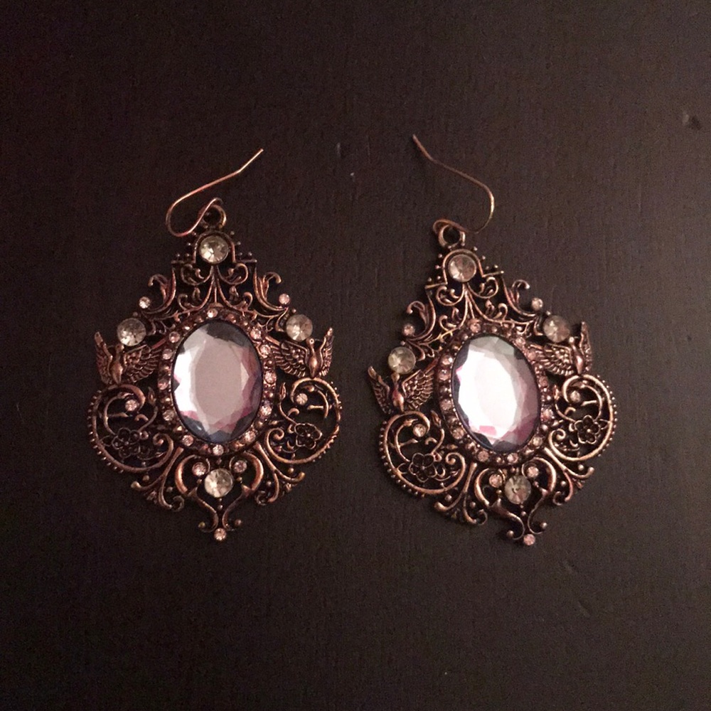 Silver pendant earrings with light blue jewel